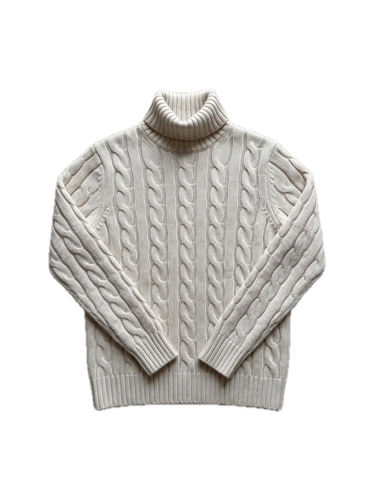 An ecru cable-knit roll-neck jumper, cut out from its photo
